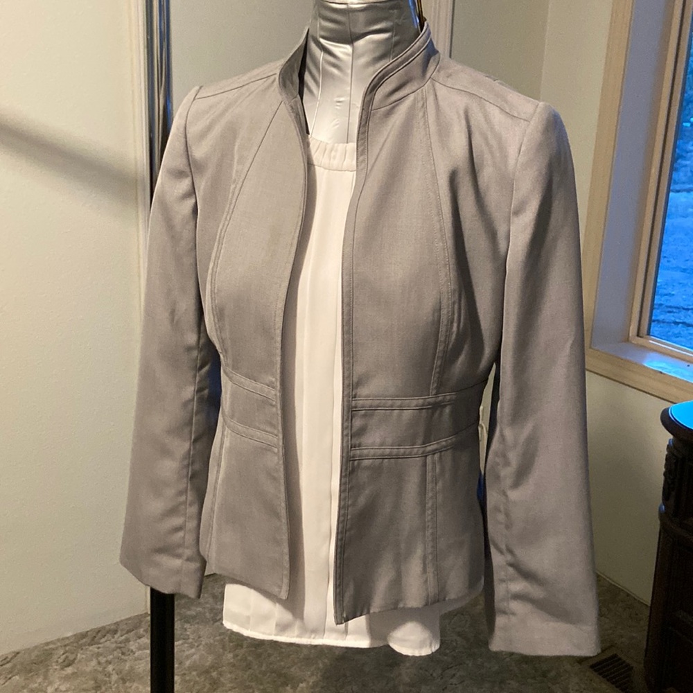 Gray Calvin Klein blazer with matching skirt. Size 8p